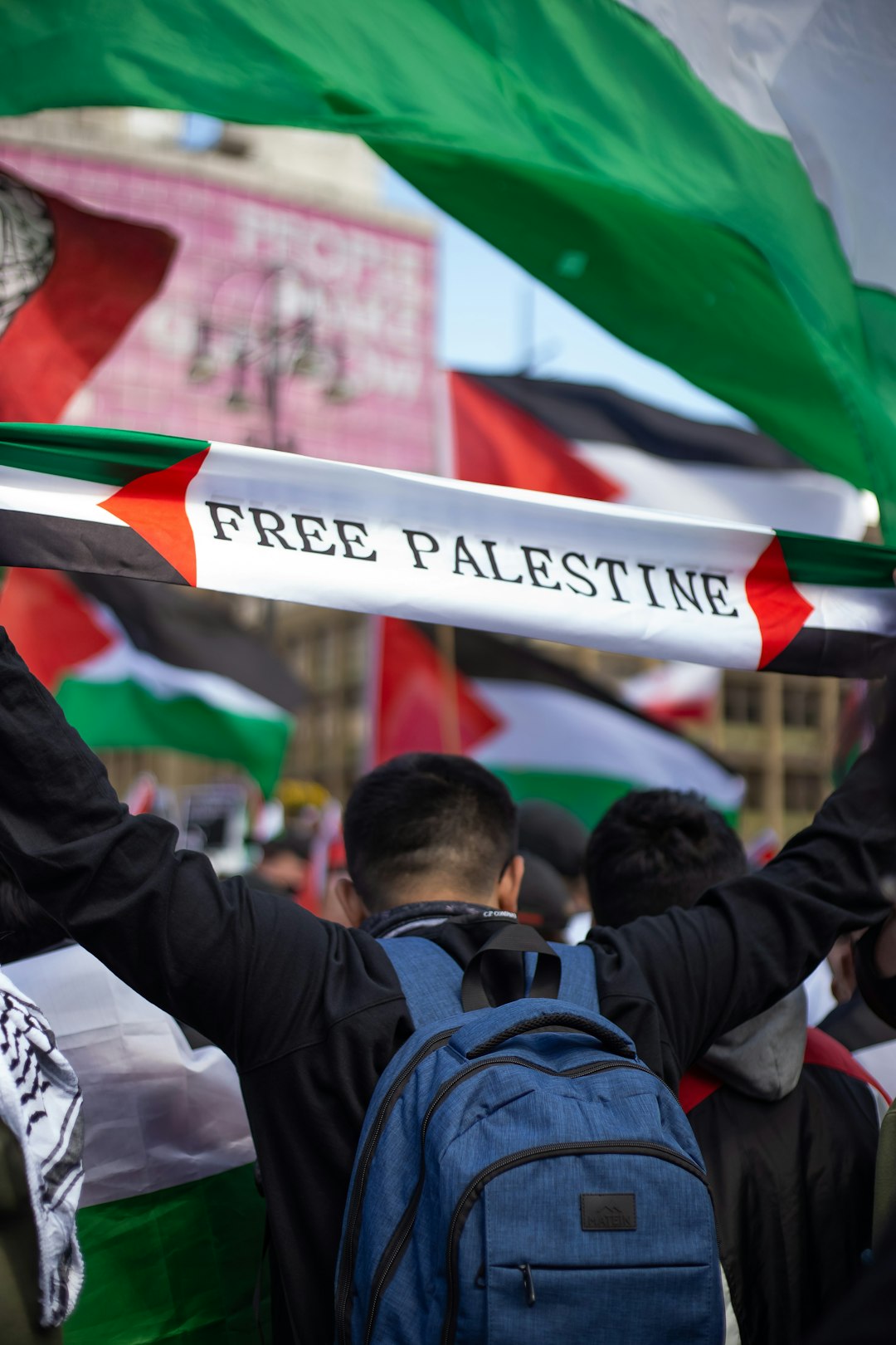 people holding a banner